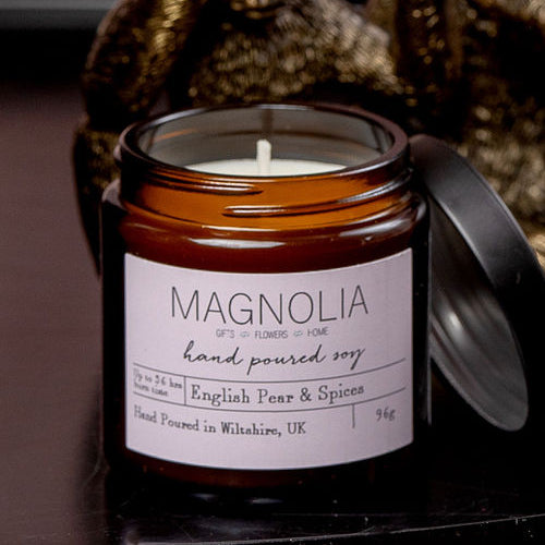 Black Oud Scented Candle - 96g - Magnolia the Florist Introduce an air of luxury with our Black Oud candle. Our scented candle exudes the warm, woody aroma of black oud. The sleek jar adds a touch of exclusivity and is perfect for setting the mood or unwinding after a long day. Enjoy the aromatic benefits while enhancing any room with a touch of elegance, made with a professional blend of scented oil & emollient wax balm.