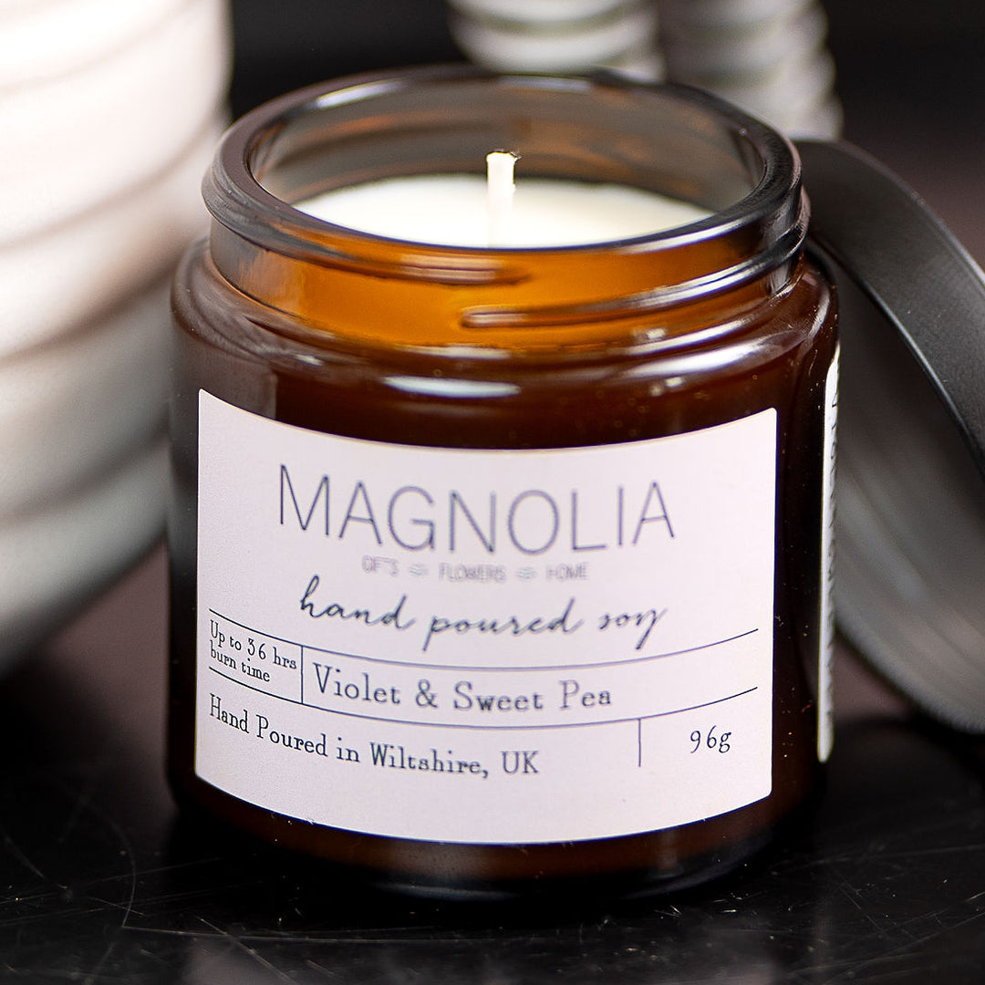 Stem Ginger & Walnut Scented Candle - 96g - Magnolia the Florist Introduce a warm and cosy atmosphere to your space with our Stem Ginger and Walnut Scented Candle. This sophisticated and long-lasting candle comes in a screw top jar for easy use and offers a delightful ginger and walnut scent that will soothe and relax your senses. Enjoy the aromatic benefits while enhancing any room with a touch of elegance, made with a professional blend of scented oil & emollient wax balm.