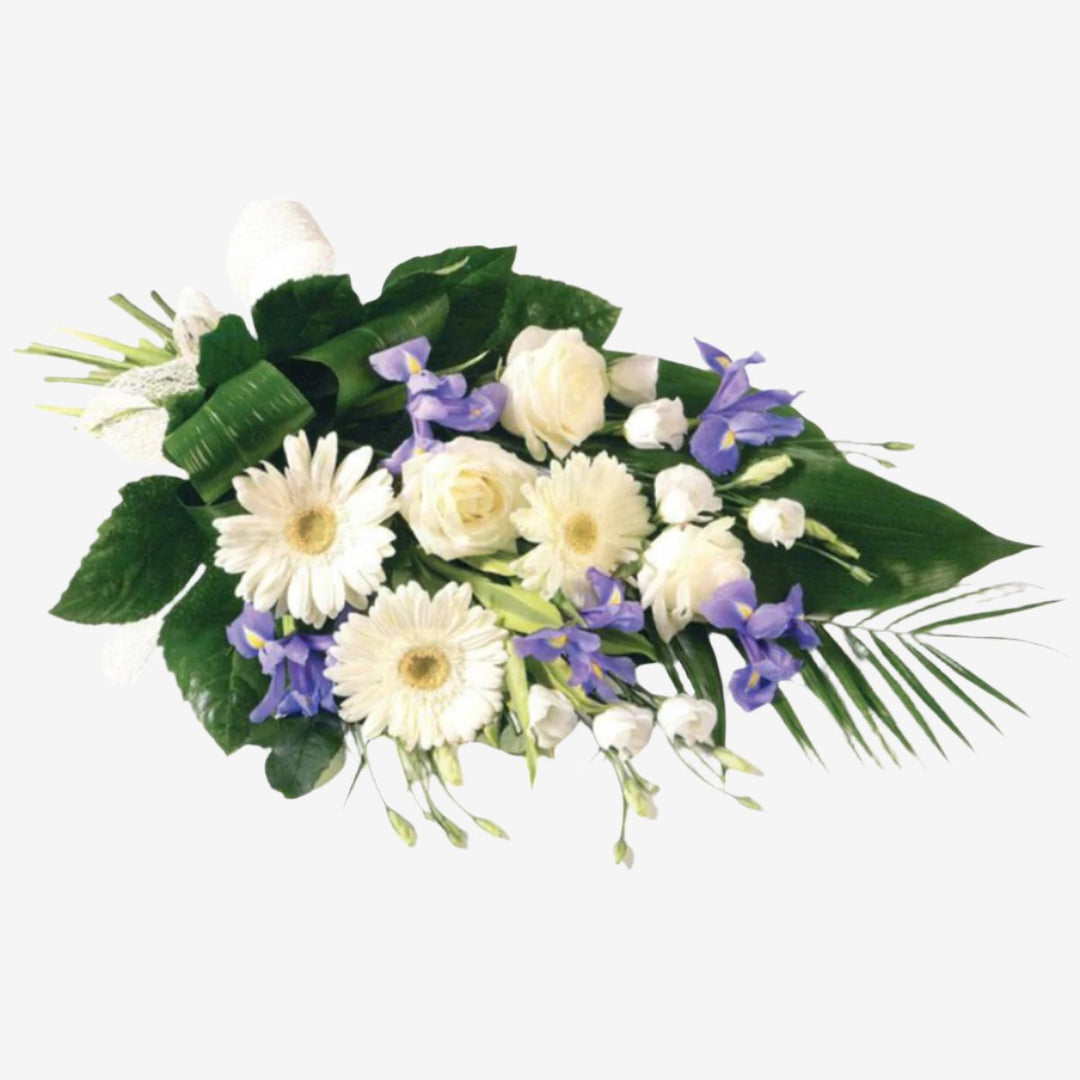 Purple & White Sheaf - Magnolia the Florist The soft blue shades of Iris are complemented by white Germini, large-headed Roses and Lisianthus in this classic sheaf, which is tied together with a natural ribbon. If you cannot find what you want on our site, please call our sales team, we're always happy to assist you. This item requires 2 days notice to order.