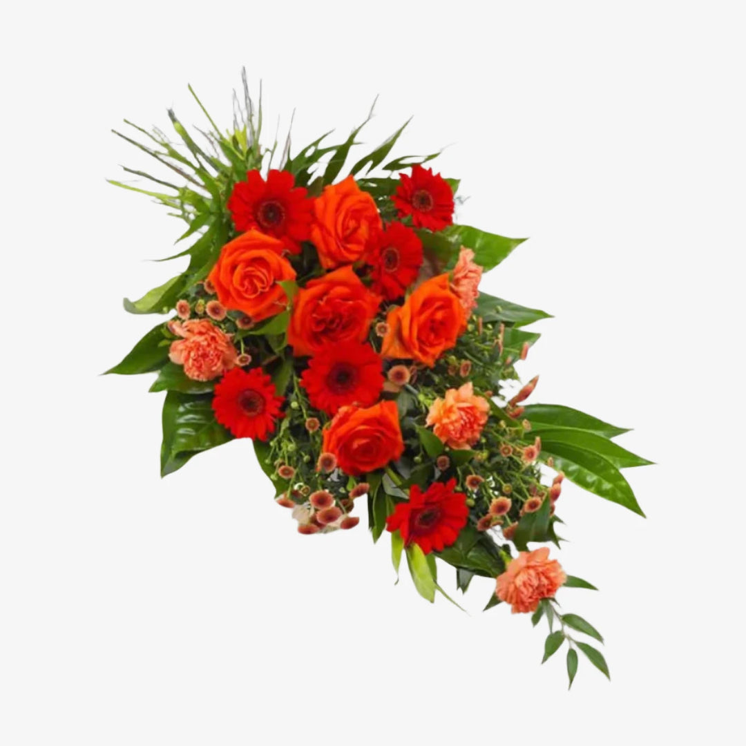 Orange & Red Hand-Tied Sheaf - Magnolia the Florist This hand-tied funeral sheaf features a vibrant mix of orange and red-toned flowers, including Roses, Carnations, mini Gerbera, and mixed foliage. Express your deepest sympathies with this beautiful arrangement. If you cannot find what you want on our site, please call our sales team, we're always happy to assist you. This item requires 2 day notice to order.