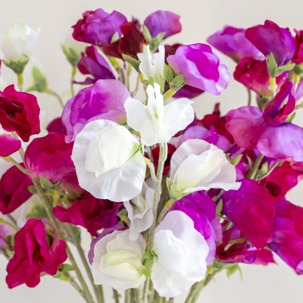 Sweet Pea 45cm - Magnolia the Florist These delightful Sweet Peas look as if they’ve been freshly picked and would brighten the dullest of days. Please note that colours vary.