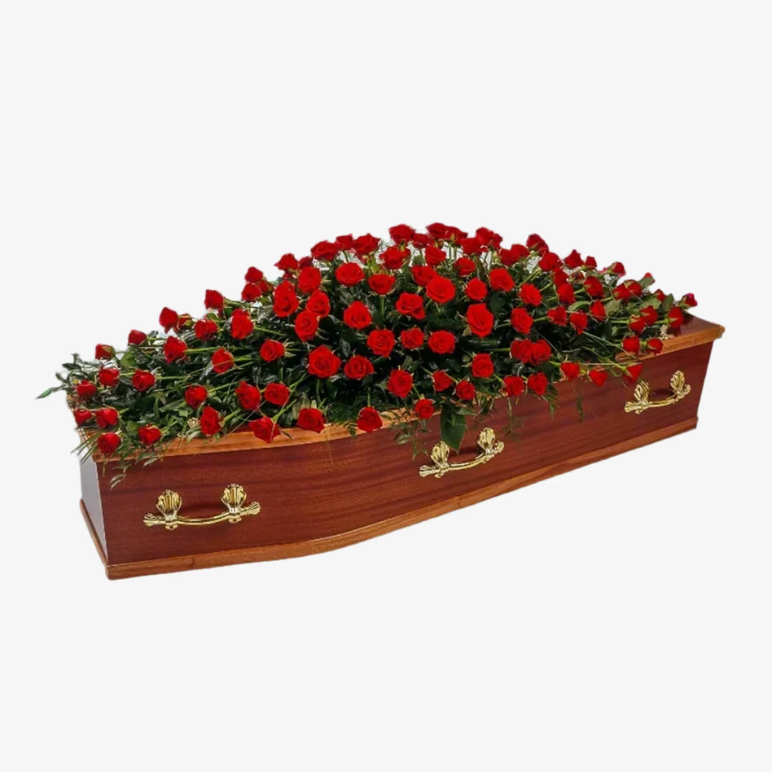 Rose Casket Spray - Magnolia the Florist Large and small-headed Roses combine with luxurious foliage to create this traditional Rose Casket Spray. The image shows Red roses, although other colours are available. Please select what colour roses you would like. If you cannot find what you want on our site, please call our sales team, we're always happy to assist you This item requires 2 days notice to order.