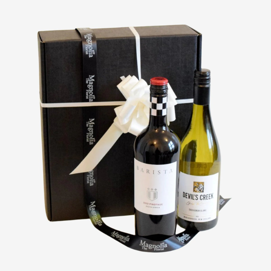 Wine Duo Gift Box - Magnolia the Florist Our fantastic gift box features two of our finest 75cl bottles of wine and is lovingly wrapped in a presentation box.Please note that this brand may be substituted for something of similar quality. We will not sell or deliver alcohol to anyone who is or appears to be, under the age of 18. By placing an order you confirm that you are at least 18 years old and we reserve the right not to deliver if we are unsure of this.